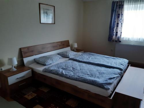 Postel nebo postele na pokoji v ubytování Ferienwohnung Haus Graf