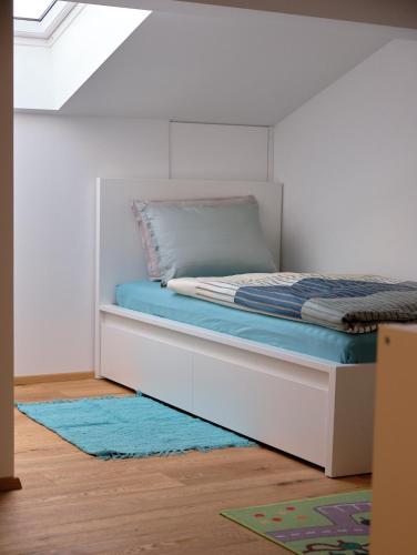 Postel nebo postele na pokoji v ubytování Apartma La Casa