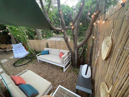 Jardin de l'établissement Maison dans les Arbres, SPA, Tennis, Parking