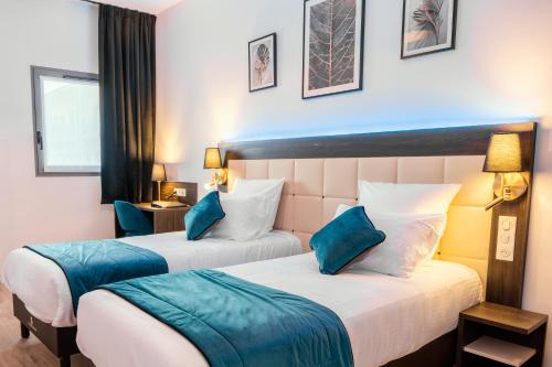Posteľ alebo postele v izbe v ubytovaní Cottages de France CDG