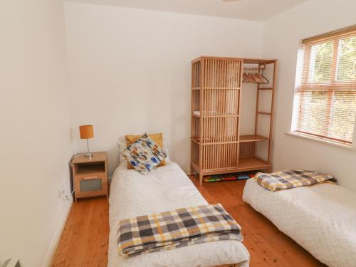 Postel nebo postele na pokoji v ubytování 1 Closheen Lane
