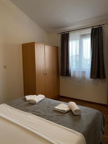 Postel nebo postele na pokoji v ubytování Villa Marija Novalja