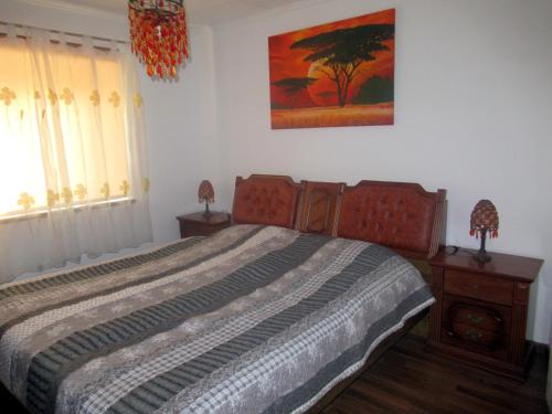Voodi või voodid majutusasutuse Apartma Qbed toas