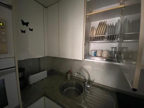 Una cocina o zona de cocina en Appartement Marbella