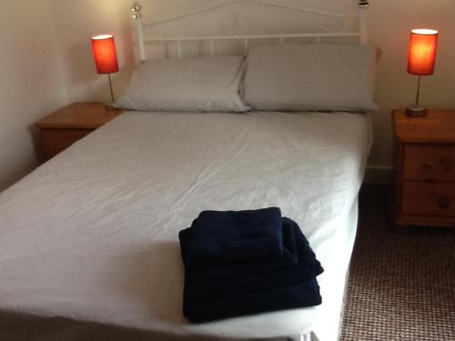 Ένα ή περισσότερα κρεβάτια σε δωμάτιο στο Noreen Seans
