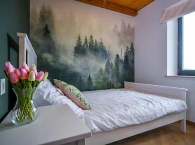 Postel nebo postele na pokoji v ubytování Nini House Dunajek