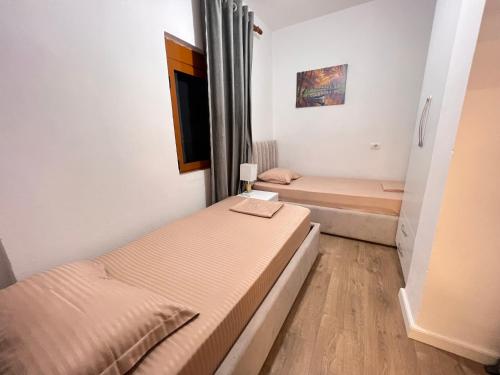 Postel nebo postele na pokoji v ubytování Arteg Apartments - Superior