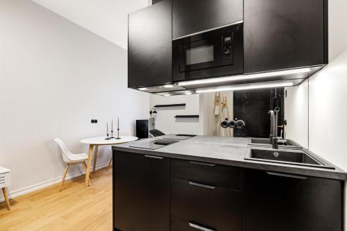 Kuchyň nebo kuchyňský kout v ubytování Golden Residence in Tartu Center by EasyRentals