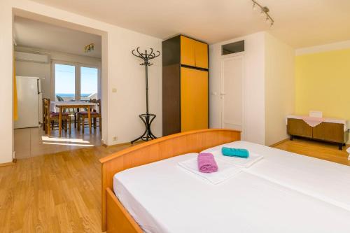 Säng eller sängar i ett rum på Apartments Barica