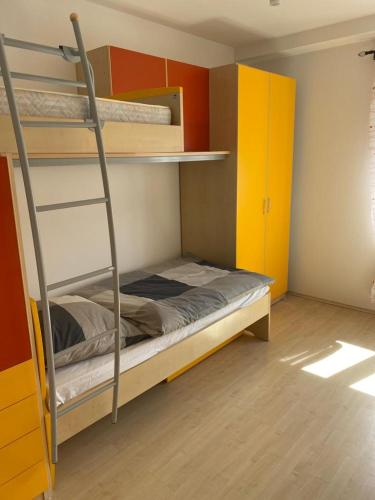 Ένα ή περισσότερα κρεβάτια σε δωμάτιο στο Ferienhaus Dalmatia