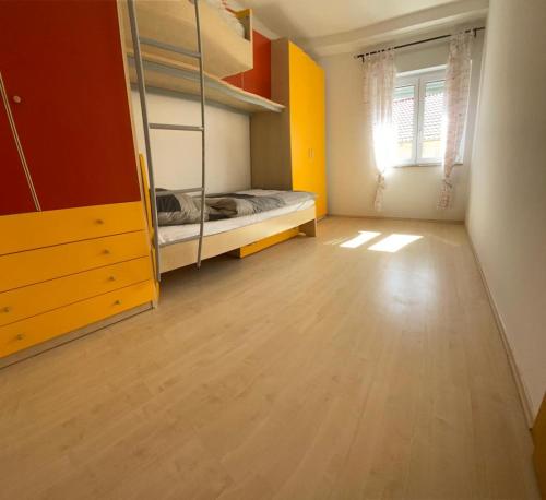 Ένα ή περισσότερα κρεβάτια σε δωμάτιο στο Ferienhaus Dalmatia