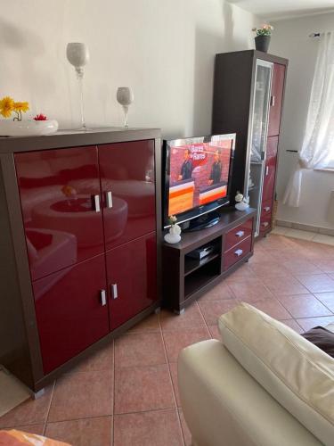 Μια τηλεόραση ή/και κέντρο ψυχαγωγίας στο Ferienhaus Dalmatia