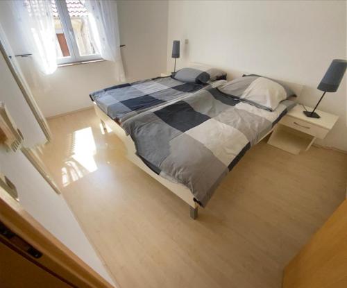 Ένα ή περισσότερα κρεβάτια σε δωμάτιο στο Ferienhaus Dalmatia