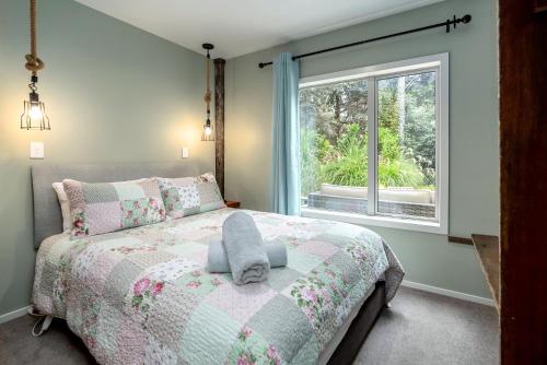 Giường trong phòng chung tại The Glade