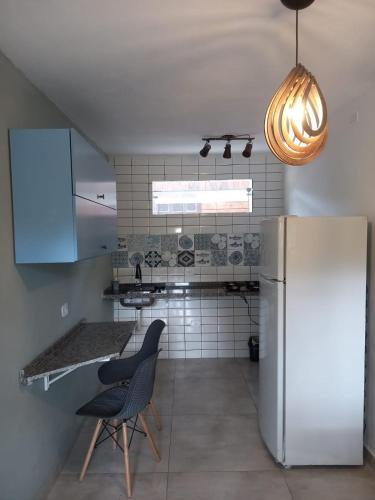Η κουζίνα ή μικρή κουζίνα στο Guest House Ilha do Mel