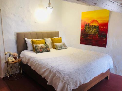 Postel nebo postele na pokoji v ubytování Casa Medieval