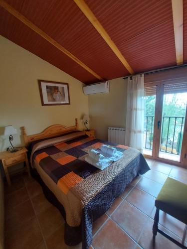Postel nebo postele na pokoji v ubytování Casas Rurales El Cobijo de Sierra Cazorla