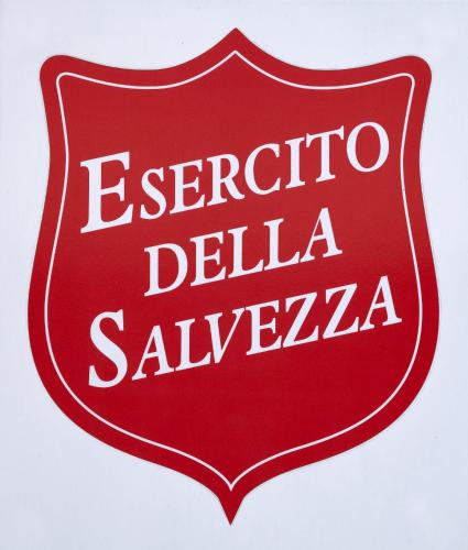 a red sign with the words esperato del salvo at Foresteria Roma Esercito della Salvezza in Rome