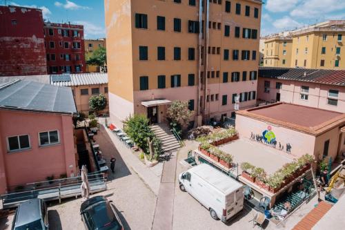 an aerial view of a city with cars and buildings at Foresteria Roma Esercito della Salvezza in Rome