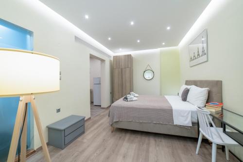 Posteľ alebo postele v izbe v ubytovaní Luxury Suites with KING-SIZED bed