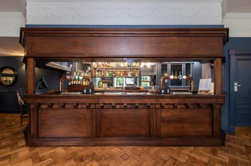 Ο χώρος του lounge ή του μπαρ στο Statham Lodge Hotel