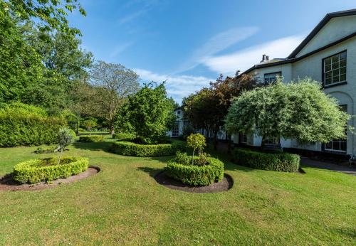 Κήπος έξω από το Statham Lodge Hotel