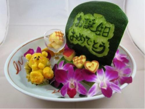 a plate of food with a bear and flowers at Jakomaru Park Tsuda in Sanuki