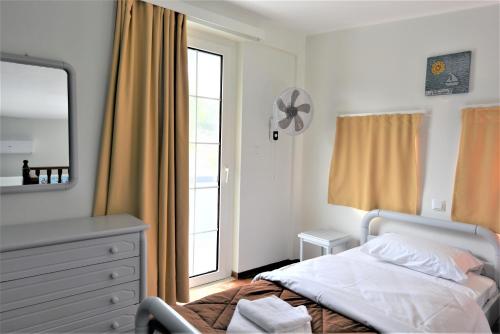 Meraki Apartments and Studiosにあるベッド