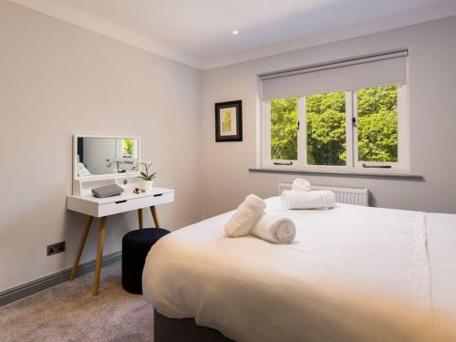 Postel nebo postele na pokoji v ubytování Bellman Cottage