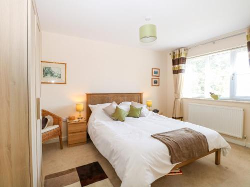 Ένα ή περισσότερα κρεβάτια σε δωμάτιο στο Flintstone Cottage