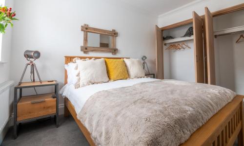 Cama ou camas em um quarto em Fell Briggs Cottage