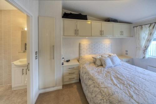 Postel nebo postele na pokoji v ubytování The Warren D7