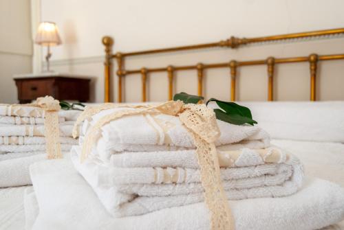 Posteľ alebo postele v izbe v ubytovaní B&B Risveglio col Rosone