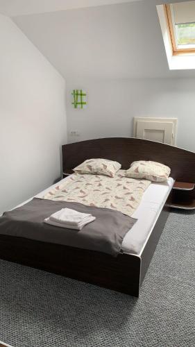 Säng eller sängar i ett rum på Casa Ormenisan
