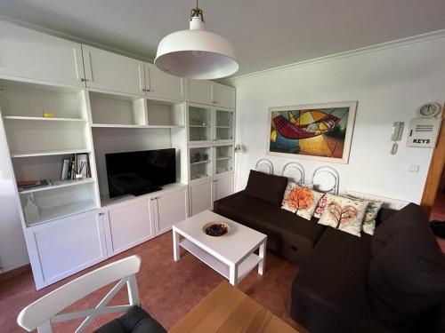 TV a/nebo společenská místnost v ubytování Apartamento Lagos Azules I