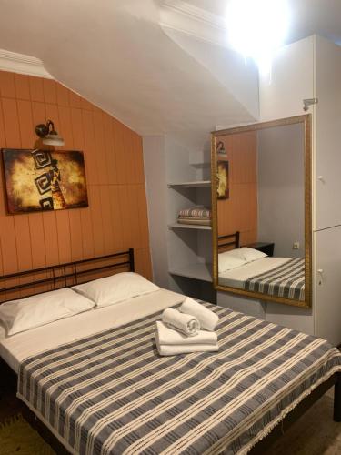 Llit o llits en una habitació de Volare Apart