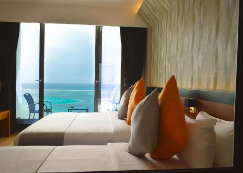 Cama o camas de una habitación en Triton Prestige Seaview and Spa