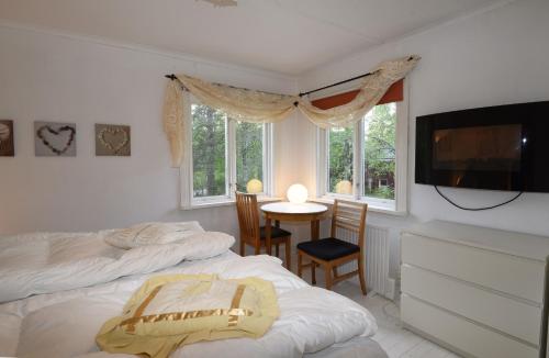 Postel nebo postele na pokoji v ubytování Cozy cottage near untouched wilderness and skiing