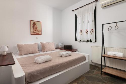 Ένα ή περισσότερα κρεβάτια σε δωμάτιο στο Pure Nature Cottage