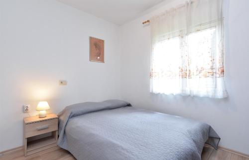 Ένα ή περισσότερα κρεβάτια σε δωμάτιο στο House Fazana 1456