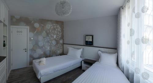 A bed or beds in a room at Flat in Nesebar. Two minutes away from the beach.