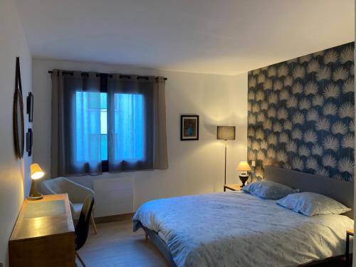 Posteľ alebo postele v izbe v ubytovaní Appartement en centre ville avec roof top