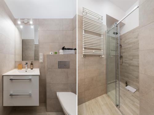a bathroom with a shower and a toilet and a sink at Rent like home - River City Apartments in Wrocław