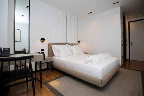 Nobus Hotel & Spaにあるベッド