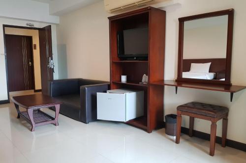A television and/or entertainment centre at V Resotel