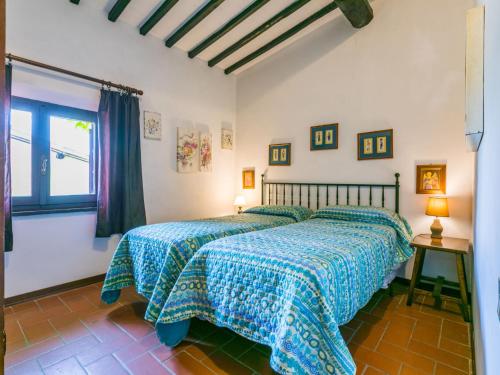 Postel nebo postele na pokoji v ubytování Apartment Bardeggiano - Caterina 1 by Interhome