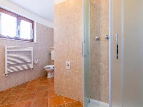 a bathroom with a shower and a toilet at Holiday Home Metallo by Interhome in Colle Val D'Elsa
