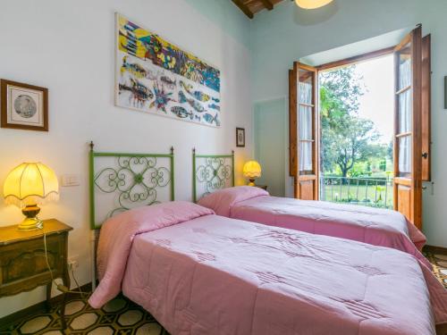 Postel nebo postele na pokoji v ubytování Apartment Giuggiolo 4 by Interhome