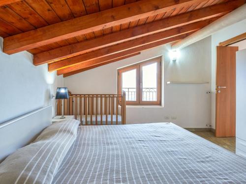 Postel nebo postele na pokoji v ubytování Holiday Home Rustico Maria - DMA392 by Interhome