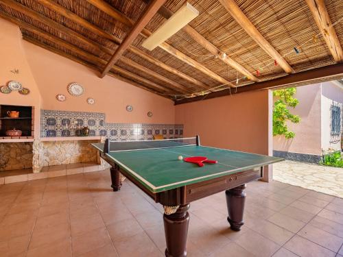 a room with a ping pong table in it at Holiday Home Isaurinda by Interhome in Faro